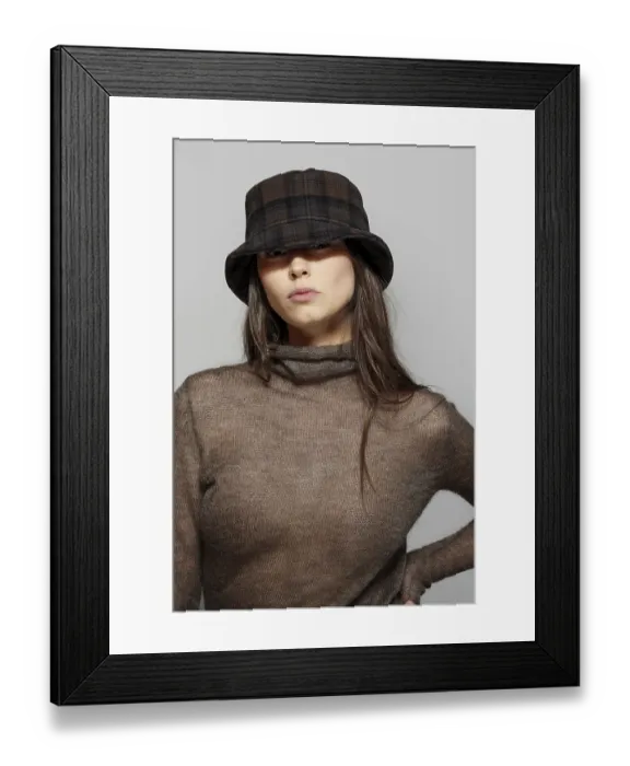 Framed Print : Portrait of beautiful girl in angora sweater and plaid wool hat