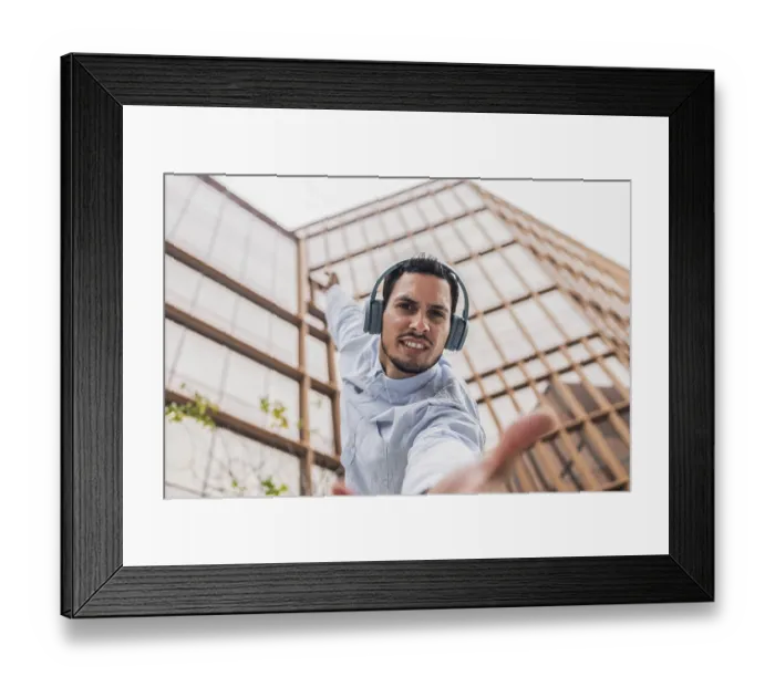 Framed Print : A young Cuban man in a light blue shirt