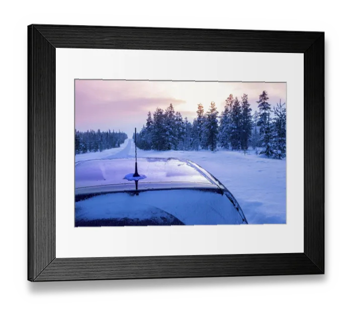 Framed Print : Empty highway in the winter forest