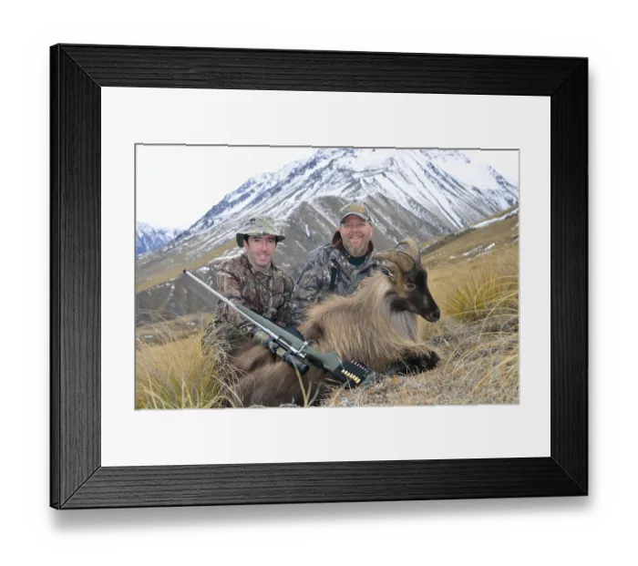 Framed Print : Hunters pose with their Himalayan tahr in the Southern Alps of New Zealand
