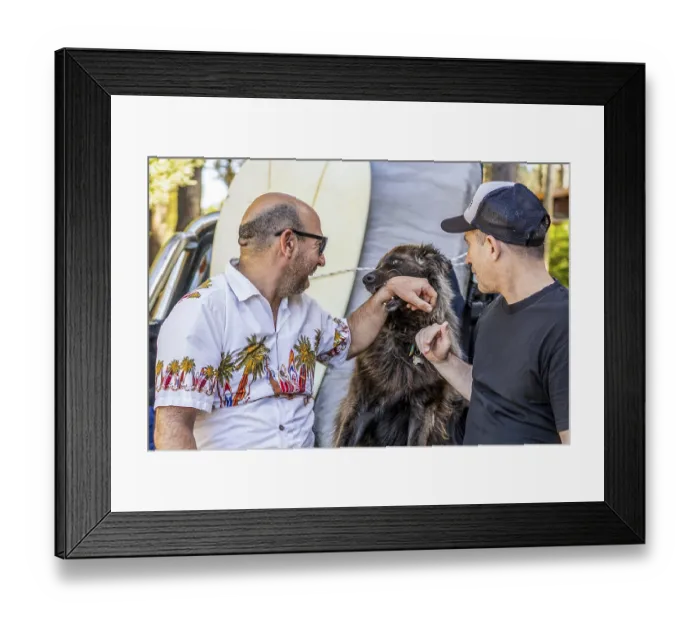 Framed Print : Two men and a dog smiling in the back of a pickup truck
