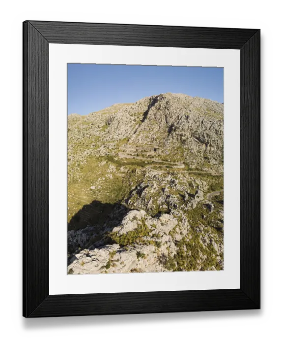 Framed Print : Panoramic landscape. Hairpin turn road MA-2141 between rocky mountains