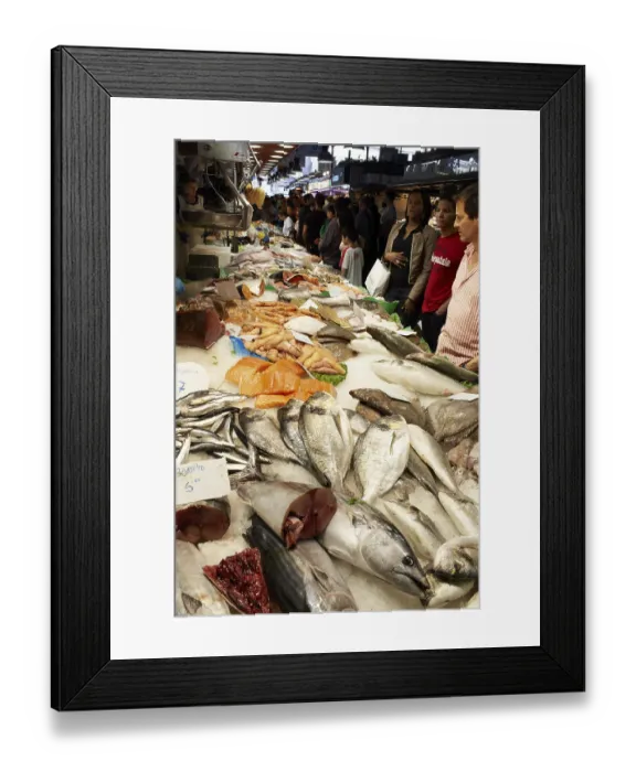 Framed Print : BARCELONA - MAY 26: The buyers of fish at the market on May