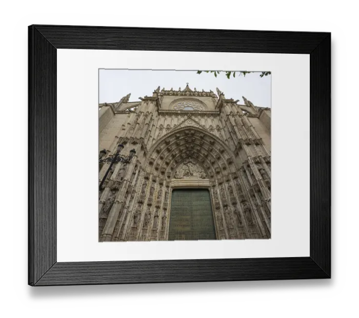 Framed Print : Impressive Gothic facade with detailed portal and richly decorated sculptures
