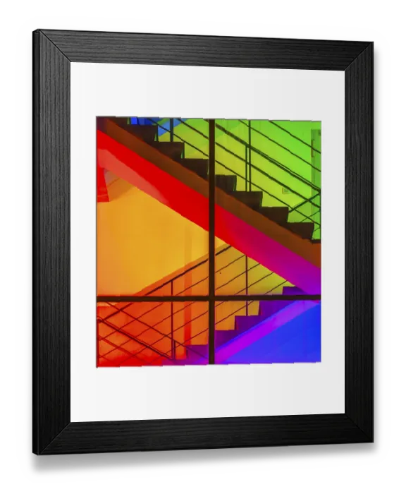 Framed Print : View through the windows of a brightly lit staircase
