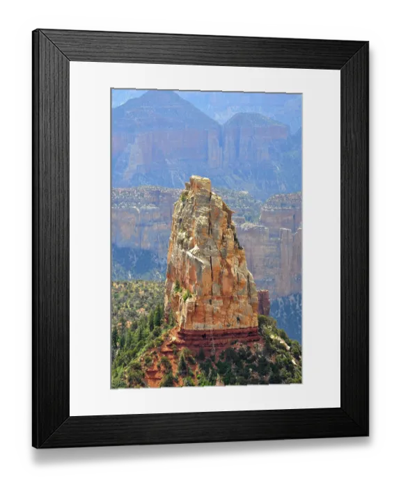Framed Print : A massive rock rises steeply in a canyon landscape Framed Print : A massive rock rises steeply in a canyon landscape