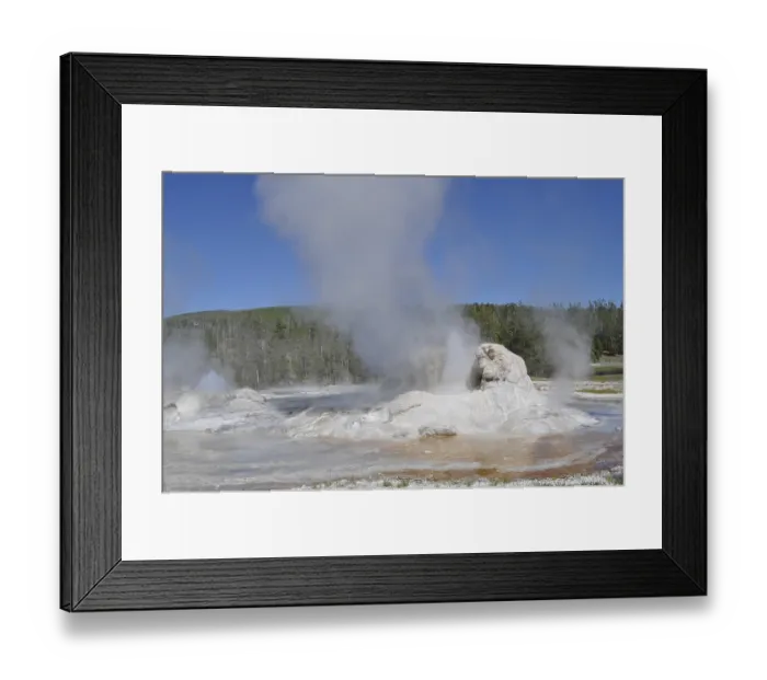 Framed Print : A geyser emits steam surrounded by rocks and natural landscape Framed Print : A geyser emits steam surrounded by rocks and natural landscape