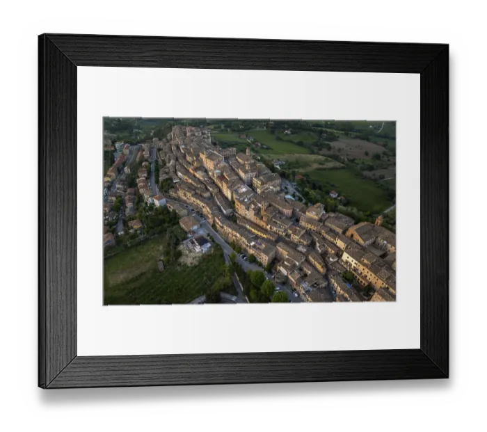 Framed Print : Aerial view of Treia, Italy, highlighting its remarkable medieval architecture nestled amid lush fields
