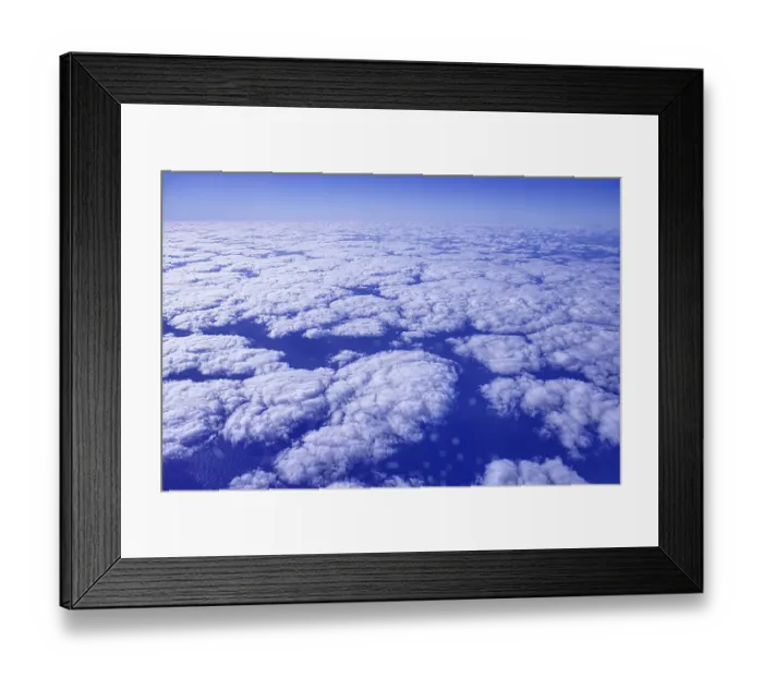 Framed Print : Approach to Arrecife with aerial views of a sea of clouds under a blue sky