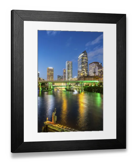 Framed Print : Tampa skyline with skyscrapers and bridge over Hillsborough River at night in downtown Tampa Framed Print : Tampa skyline with skyscrapers and bridge over Hillsborough River at night in downtown Tampa