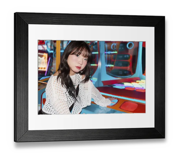Framed Print : An Asian Gen Z girl enjoys an arcade game