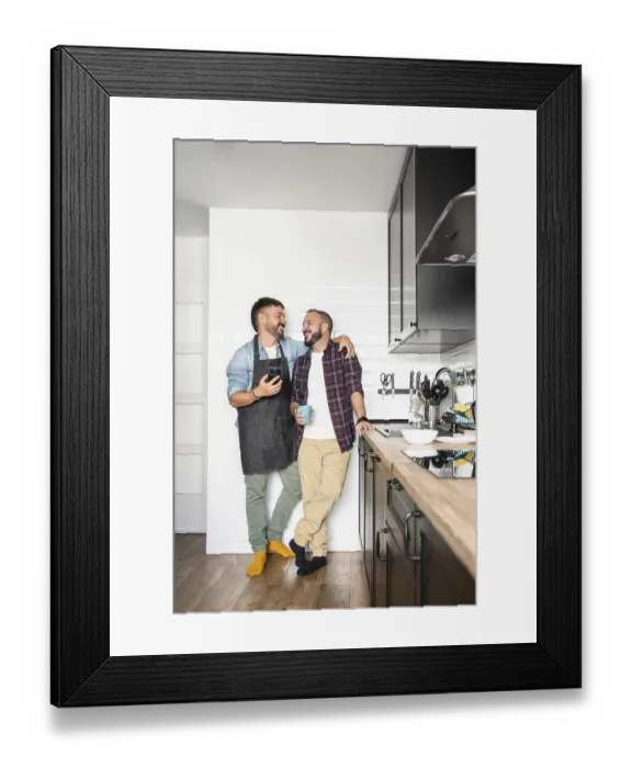 Framed Print : A gay couple standing close in a modern kitchen Framed Print : A gay couple standing close in a modern kitchen