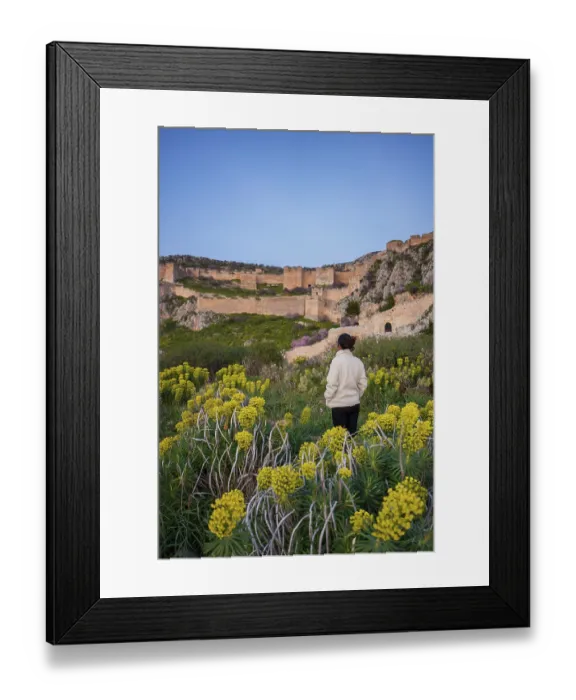 Framed Print : A woman admires the ancient Greek fortress Framed Print : A woman admires the ancient Greek fortress