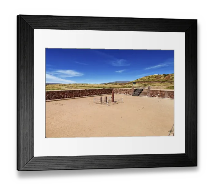 Framed Print : A rectangular square with stone pillars surrounded by ruins under a clear sky Framed Print : A rectangular square with stone pillars surrounded by ruins under a clear sky