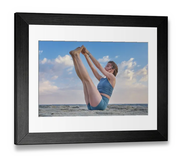 Framed Print : A woman in Ubhaya Padangusthasana