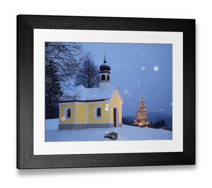 Framed Print : Maria Rast chapel with Christmas tree during snowfall
