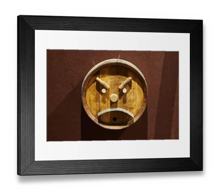 Framed Print : Creative wall art from a wooden barrel depicting a sinister face