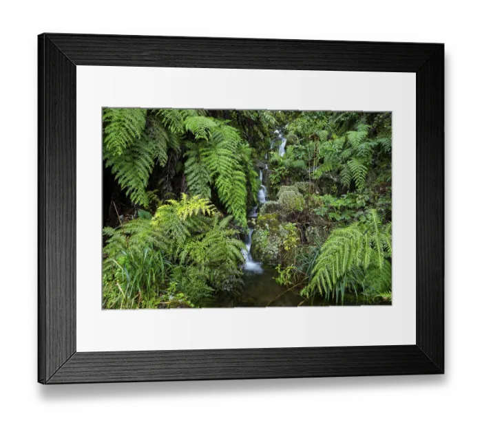 Framed Print : Cascades of a small waterfall in the secluded Framed Print : Cascades of a small waterfall in the secluded