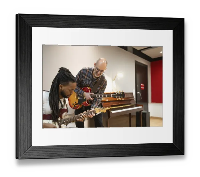 Framed Print : Two musicians play electric guitars in a vibrant recording studio Framed Print : Two musicians play electric guitars in a vibrant recording studio