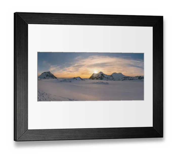 Framed Print : The sun sets behind the rugged