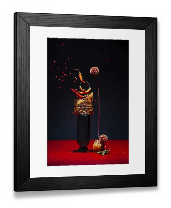 Framed Print : Dynamic display with chilies peppers and honeycomb on a black background Framed Print : Dynamic display with chilies peppers and honeycomb on a black background