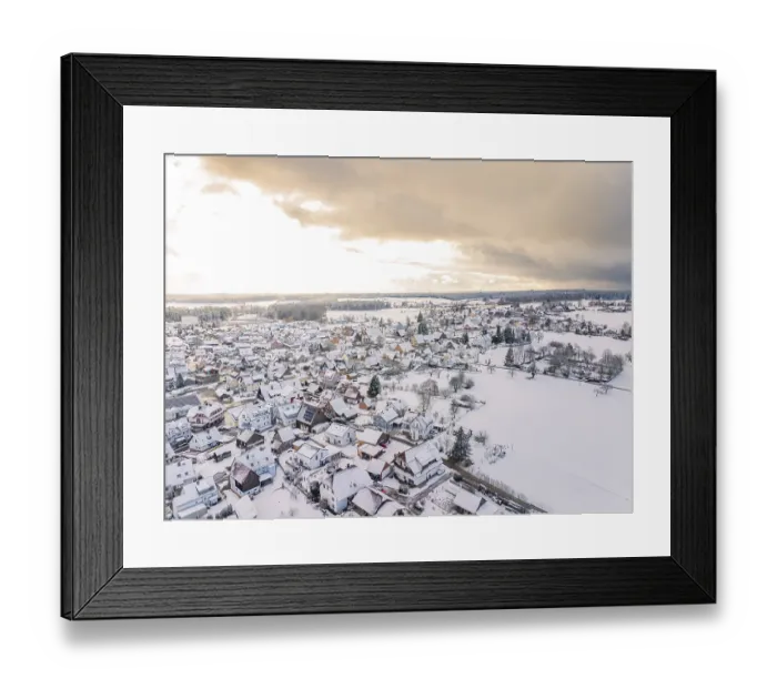 Framed Print : Snow-covered village at sunset Framed Print : Snow-covered village at sunset