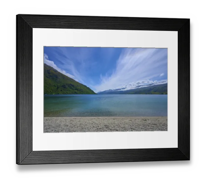 Framed Print : Expansive lake landscape under dramatic skies Framed Print : Expansive lake landscape under dramatic skies