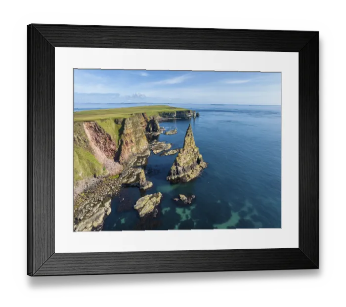 Framed Print : Aerial view of the rugged coastal landscape with the Duncansby Stacks Framed Print : Aerial view of the rugged coastal landscape with the Duncansby Stacks