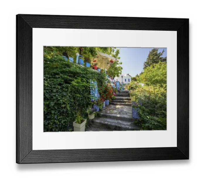 Framed Print : Flower-lined path, alley in the village of Zia