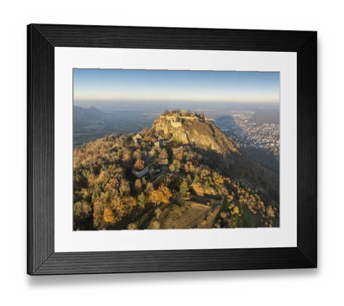 Framed Print : Aerial view of the volcanic cone Hohentwiel with the castle ruins illuminated by the evening sun
