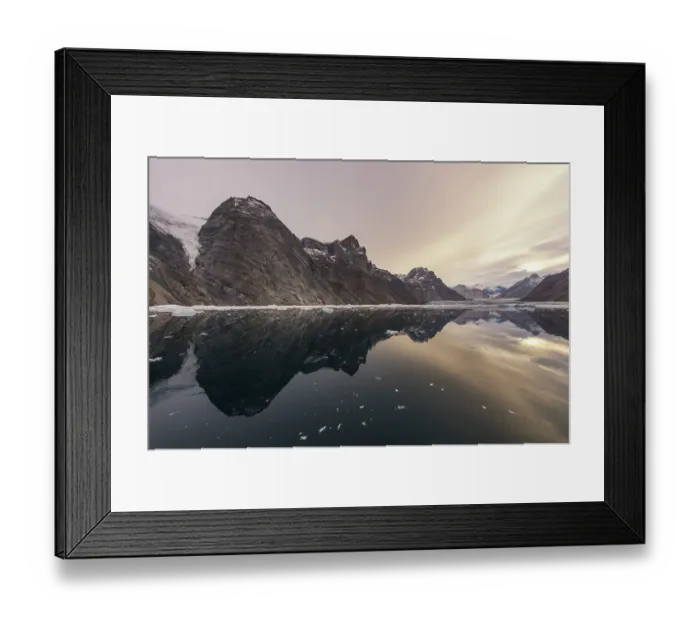 Framed Print : Reflection in the water, mountains and icebergs