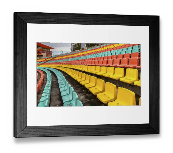 Framed Print : Colourful seats for the spectators at Friedrich Ludwig Jahn Sportpark