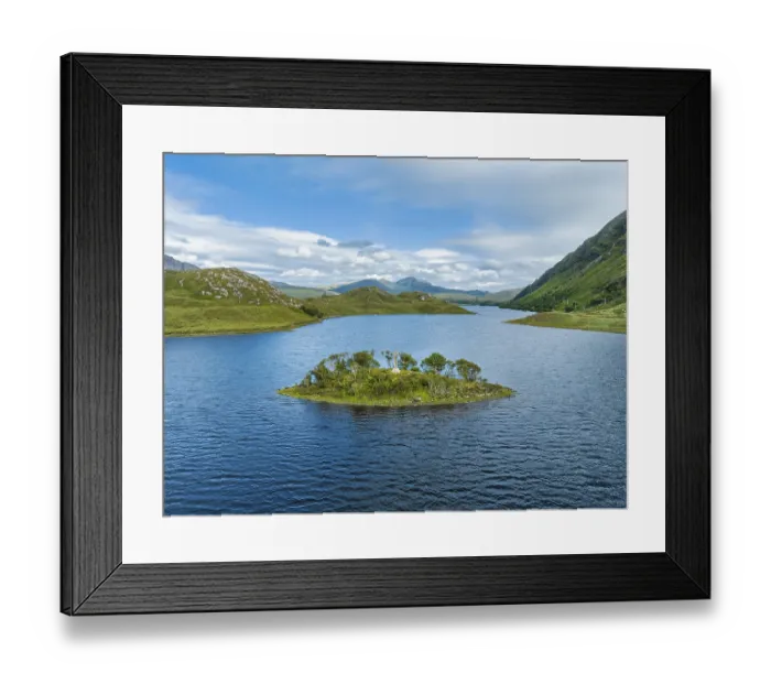 Framed Print : Aerial view of a small island with a Celtic stone cross in the freshwater loch of Loch Stack in the Northern Highlands