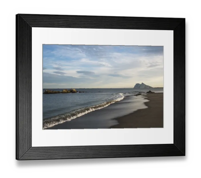 Framed Print : View of The Rock of Gibraltar and La Linea de la Concepcion as seen from the Mediterranean coast in the evening light Framed Print : View of The Rock of Gibraltar and La Linea de la Concepcion as seen from the Mediterranean coast in the evening light