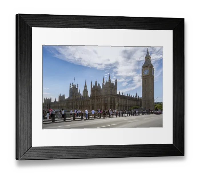 Framed Print : View of Big Ben and the Palace of Westminster with many tourists in the foreground under a partly cloudy sky