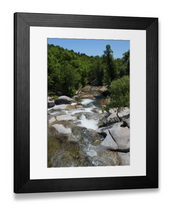 Framed Print : A picturesque river flowing over rocks Framed Print : A picturesque river flowing over rocks