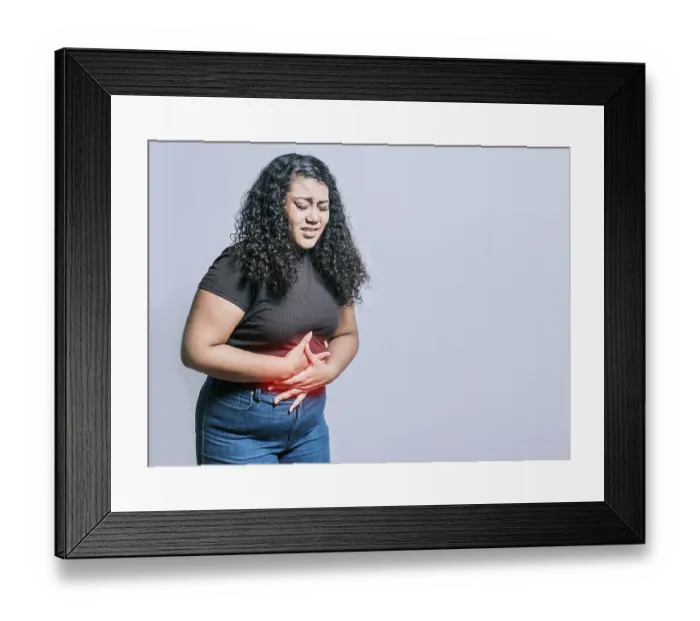 Framed Print : Woman with abdominal pain isolated Framed Print : Woman with abdominal pain isolated