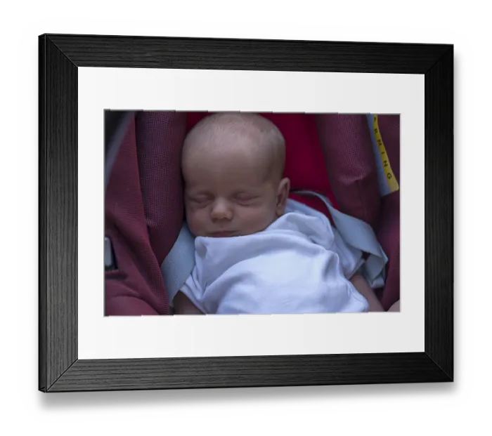 Framed Print : Baby in baby carrier, Mecklenburg-Western Pomerania