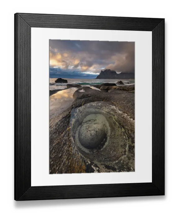 Framed Print : Rocks on the beach of Uttakleiv at evening light