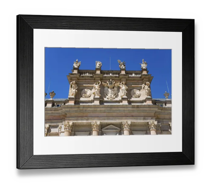 Framed Print : Detailed baroque facade art of a palace under a clear blue sky