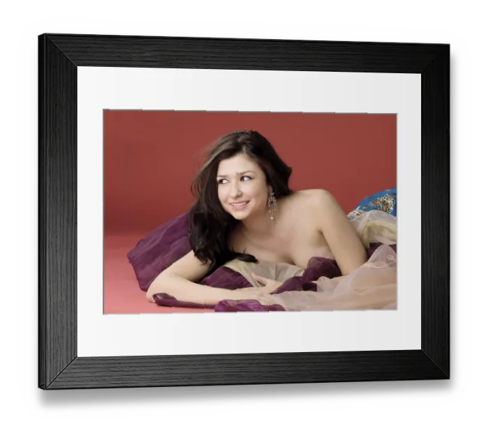 Framed Print : Young beauty woman lie on color veil and smile