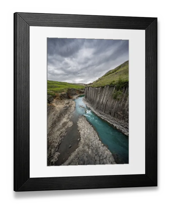 Framed Print : Stuolagil Canyon, turquoise river between basalt columns