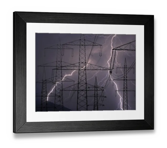 Framed Print : Power pylons in a thunderstorm
