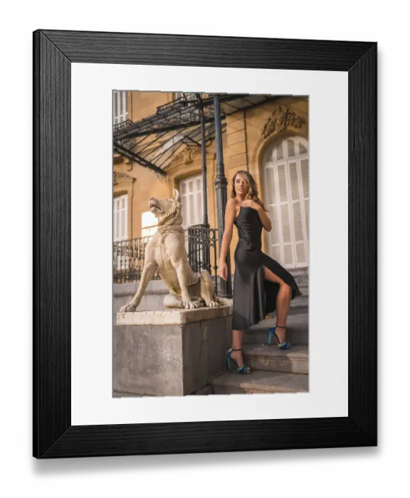 Framed Print : Portrait of a caucasian girl in a black dress the stairs of a building