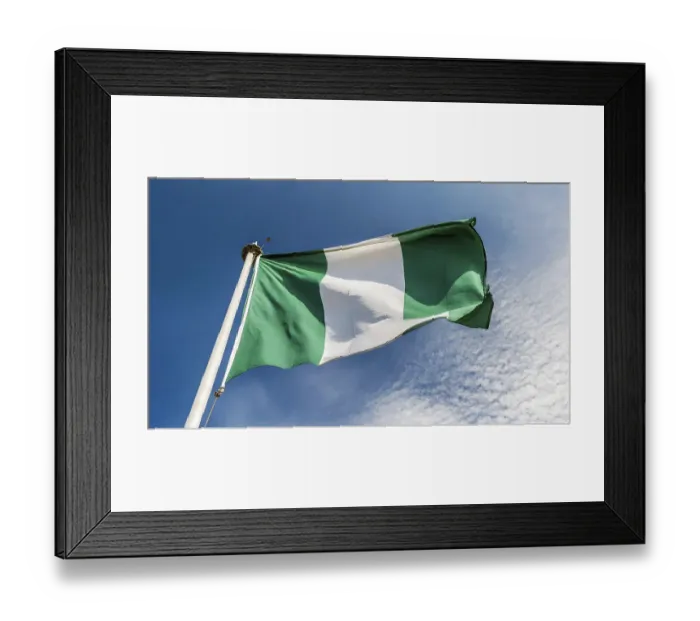 Framed Print : The flag of Nigeria flutters in the wind Framed Print : The flag of Nigeria flutters in the wind