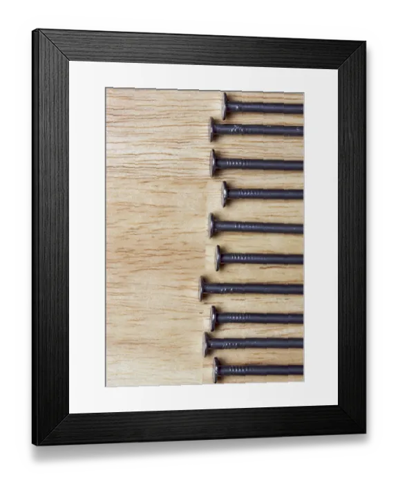 Framed Print : Macro of nails on a wood background Framed Print : Macro of nails on a wood background