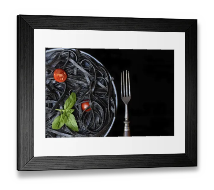 Framed Print : Black pasta coloured with squid ink and fork Framed Print : Black pasta coloured with squid ink and fork