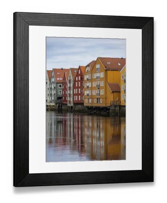 Framed Print : Colourful historic warehouses by the river Nidelva Framed Print : Colourful historic warehouses by the river Nidelva