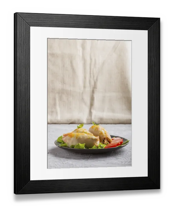 Framed Print : Stuffed baked squid with greens on a blue ceramic plate on a gray concrete background Framed Print : Stuffed baked squid with greens on a blue ceramic plate on a gray concrete background