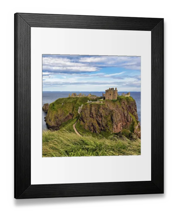Framed Print : Rocky headland with castle ruins
